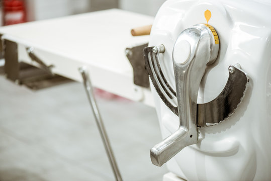 close-up shot of industrial dough roller handle