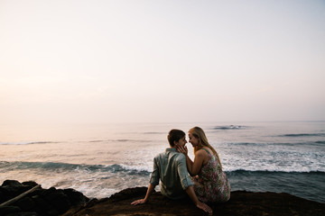 Amazing and happy couple near the ocean 