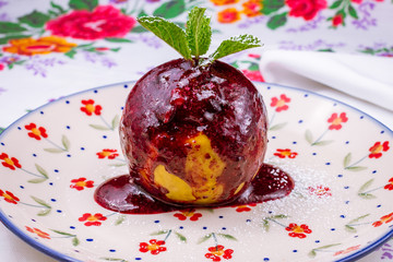 Baked Apple in berry sause