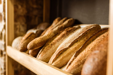 close-up shot of rural bread on shelf at pastry store