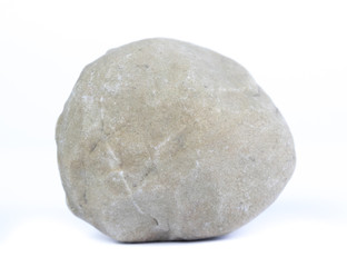 Single natural stone on white background, close-up