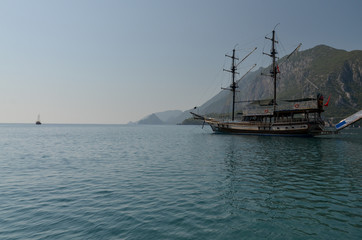 Fototapeta na wymiar traditional Turkish ship (Gulet) in Cirali bay on Mediterranean coast Antalya province, Turkey