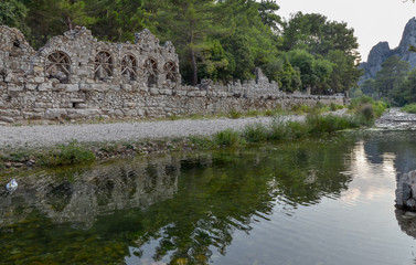 Fototapeta na wymiar river and ruins of ancient Lycian town of Olympos Cirali, Kumluca region, Antalya province, Turkey