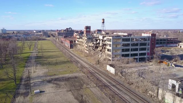 Amazing aerial over the ruined and abandoned Packard automobile factory near Detroit Michigan.