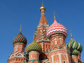 Fototapeta na wymiar St. Basil's Cathedral against the clear blue sky. Russian landmark on Red Square in Moscow 