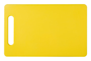 yellow plastic cutting board, new board, top view, white background