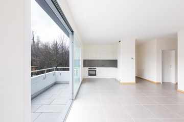 Fototapeta na wymiar New, clean and empty kitchen in the empty room