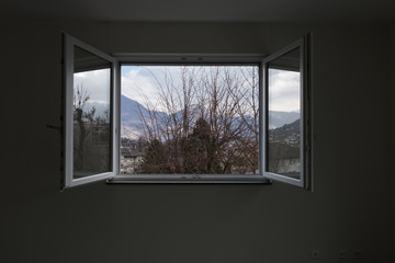 Landscape seen from the private apartment window, open window