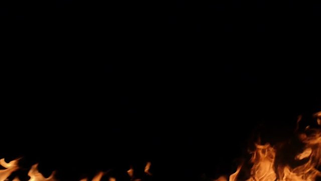 Slow motion of realistic fire wall on black background