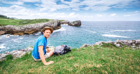 Backpacker traveler rest on the sea side