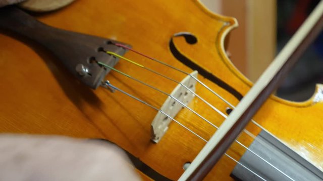 Close-up of musician playing violin, classic music