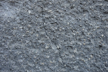 The image of the wall, plastered small stone for use as a background.