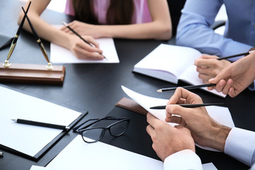 Lawyer having meeting in office, closeup