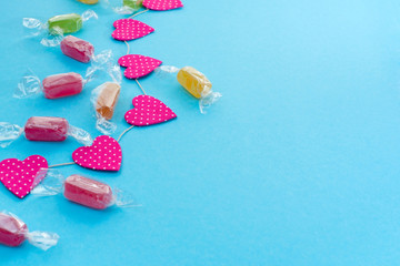 Festive background with Bright garlands of Candy Confetti.