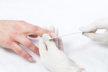 The process of the master's work in the manicure salon of female nails. 
