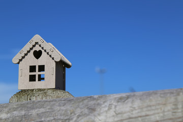 Real estate and mortgage. Wooden house .