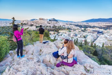Gardinen Tourist people on viewpoint sightseeing on lovely ancient Parthenon in Athens. Day scenery. © Feel good studio