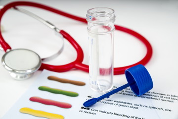Human Stool Sample.
Human stool sample waiting for testing, with a stool checking chart. 
