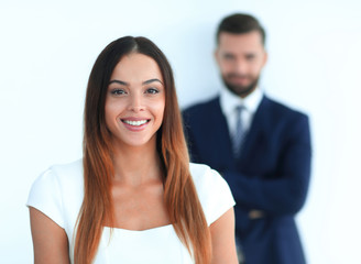 portrait of a business woman while the man is in the background