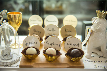 Ball of chocolate in shelf on wooden plate