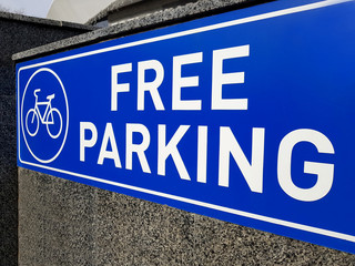 Blue sign free bicycle parking.