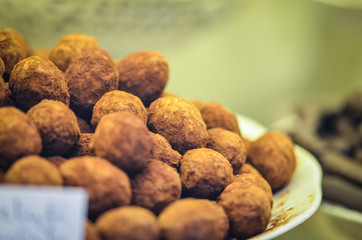 fresh chocolate candies in the candy shop window - firenze, italy