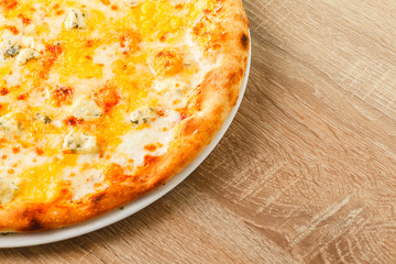 Pizza close up on a wooden table