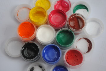 children's paints for drawing by fingers. palette of colors. gouache in jars