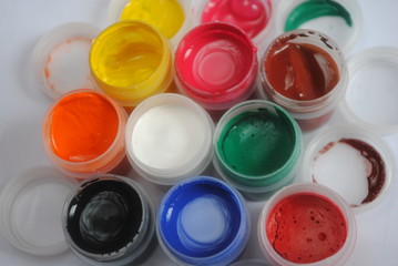 children's paints for drawing by fingers. palette of colors. gouache in jars