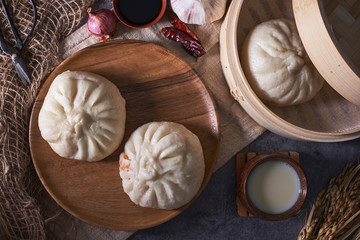 Chinese breakfast: Steamed buns (Baozi), fried breadsticks (yout