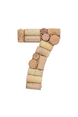 Number seven made of wine corks isolated on white