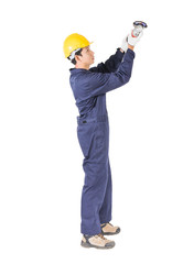 Young handyman in uniform hold grinder