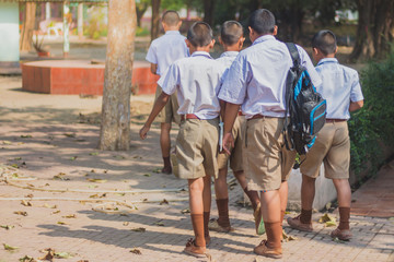 Group of Friends Having Fun on street in secondary school.