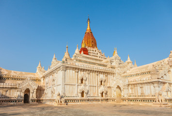 Fototapeta na wymiar Ananda Temple in Old Bagan, Myanmar. The Buddhist temple houses four standing Buddhas, each one facing the cardinal direction of East, North, West and South.