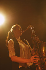 The girl playing the saxophone