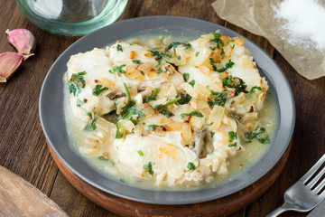 Homemade stew of hake wheels cooked in sauce