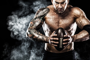 American football sportsman player isolated on black background