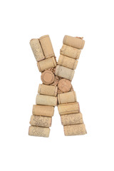 Alphabet letter X from wine corks isolated on white background