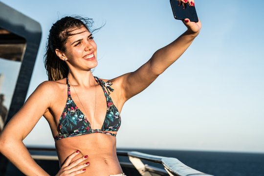 Girl Taking a Selfie on Cruise Ship
