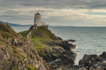 Fototapeta na wymiar The Llanddwyn island lighthouse, Twr Mawr at Ynys Llanddwyn on Anglesey, North Wales.