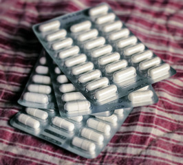 White long pill in blister
