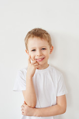 Portrait of little boy on white background