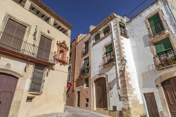 Fototapeta na wymiar Street and traditional houses in catalan village of Altafulla,province Tarragona,Costa Daurada,Catalonia.Spain.