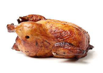 Whole roasted chicken against white background