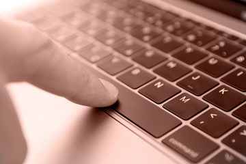 man office worker is typing keyboard, business technology and education concept sepia