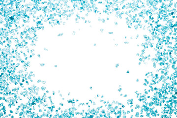 Blue crystals of sea salt. Frame on white background