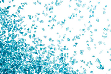 Blue crystals of sea salt on white background