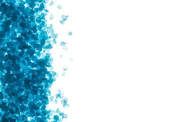 Crystals of blue sea salt. Border on white background