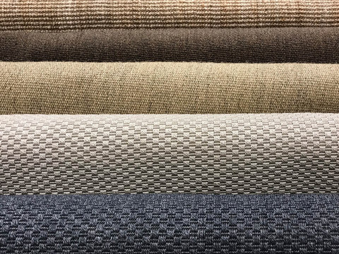 Samples of different brown woven carpet texture from sisal, blue and gray fiber for background
