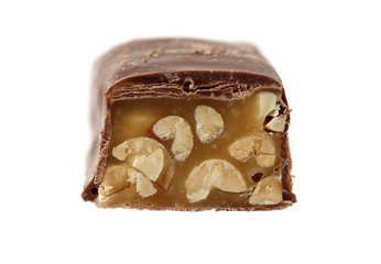 Chocolate peanut candy on white background